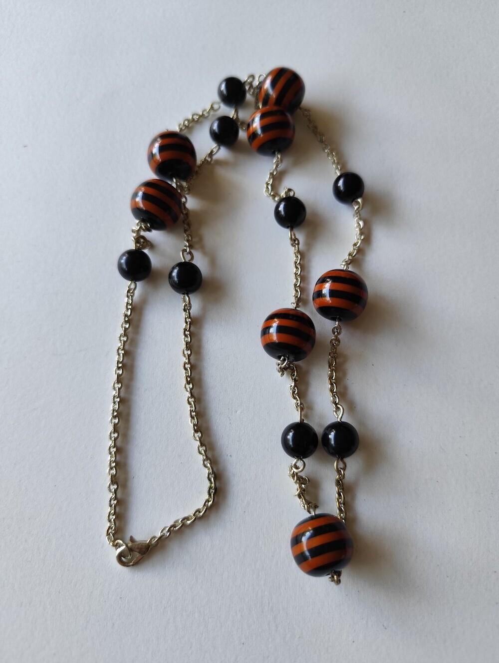 4/$50⭐️Striped Orange and Black Bead Necklace